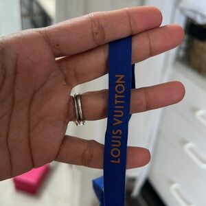 Louis Vuitton blue ribbon